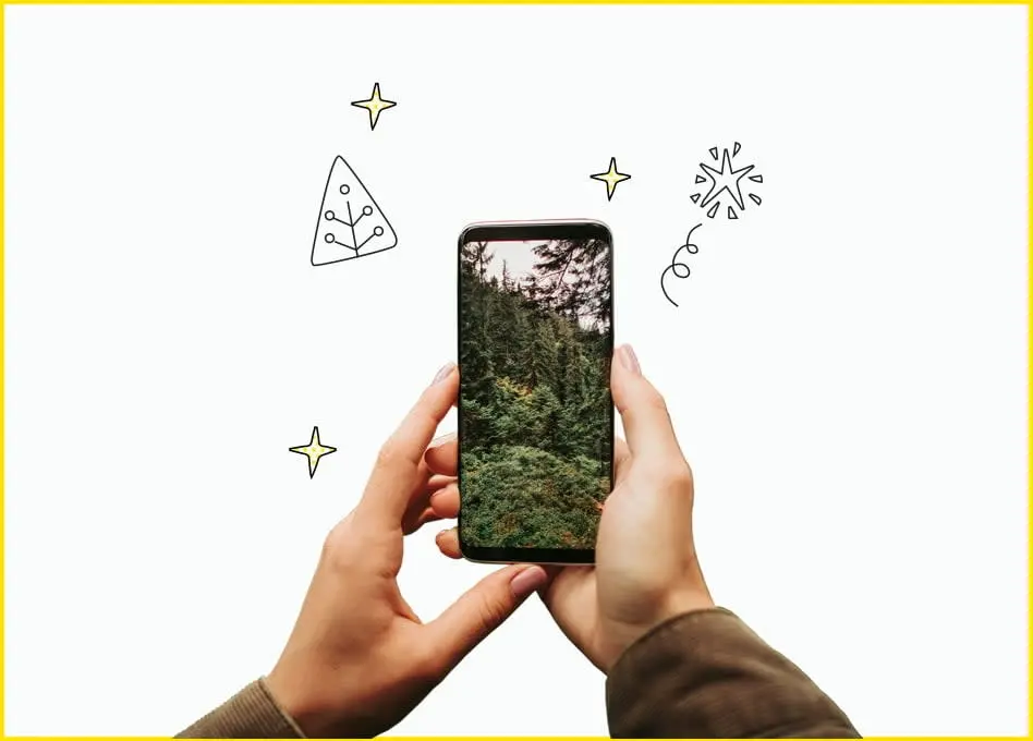 MASMOVIL Manos con móvil fondo bosque